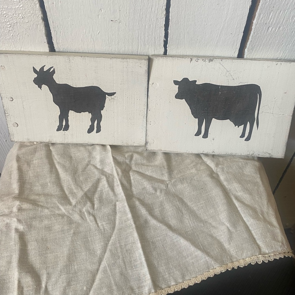 Cute, rustic, distressed wood , cow & goat 
Pictures